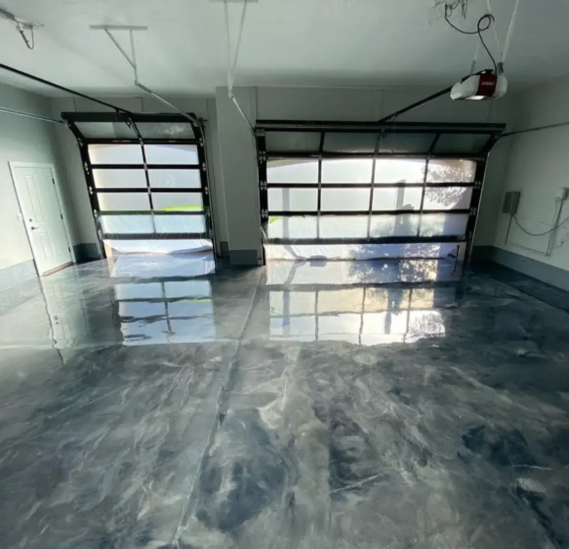 Metallic floor with blue shade in a garage