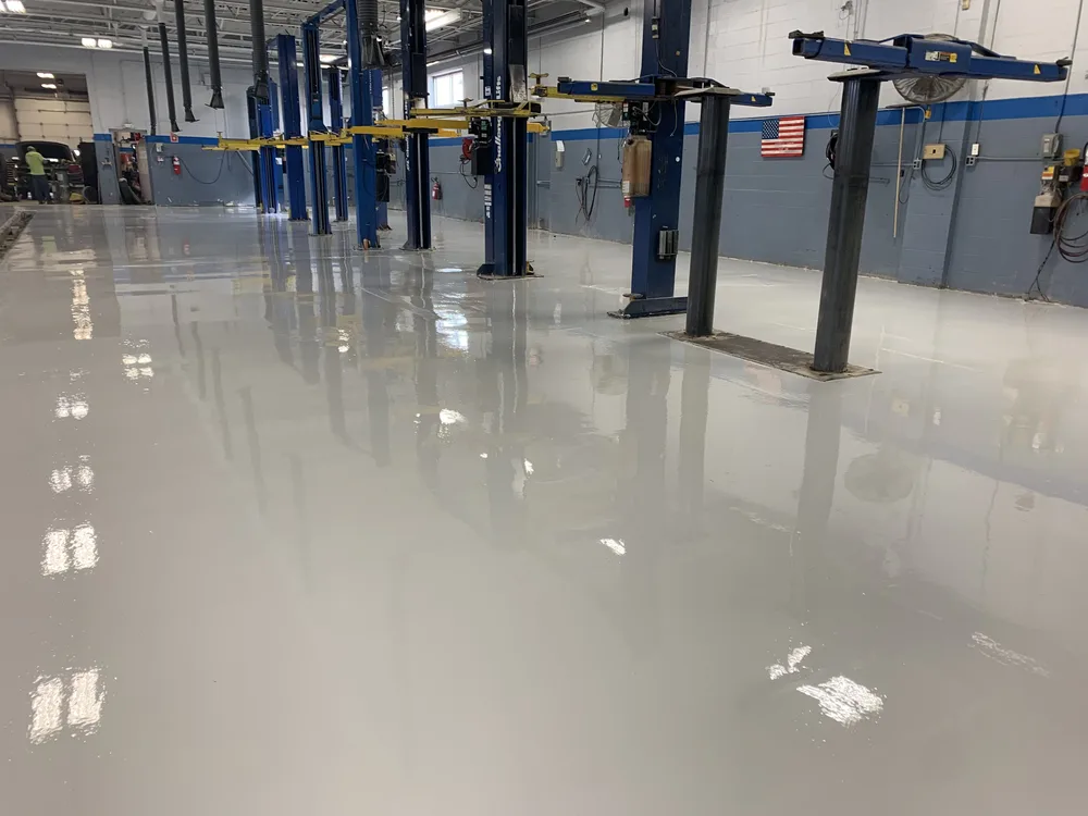Workshop epoxy flooring with solid charcoal gray color finish